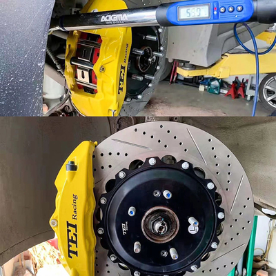 comprare 4 Piston Racing Caliper Brake Kit con 355*32 MM High Carbon Disc Racing And Brake Pads per Hyudnai Veloster 18 Inch Rim fabbricazione online